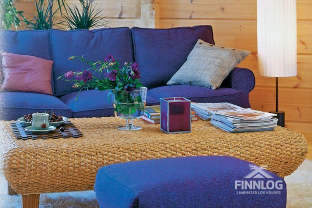 Finnlog Blockhaus Fortuna - Wohnbereich mit Couch